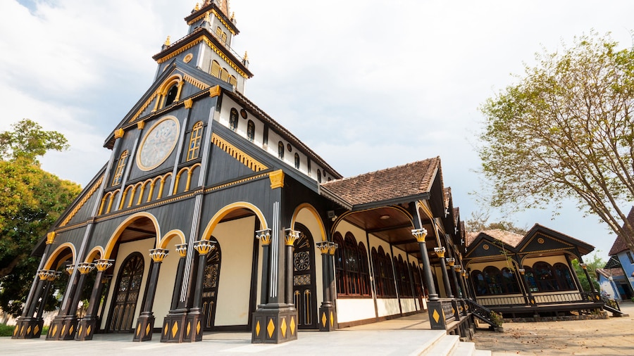 Exterior of ancient Catholic wooden church in Kon Tum, Vietnam, Asia.