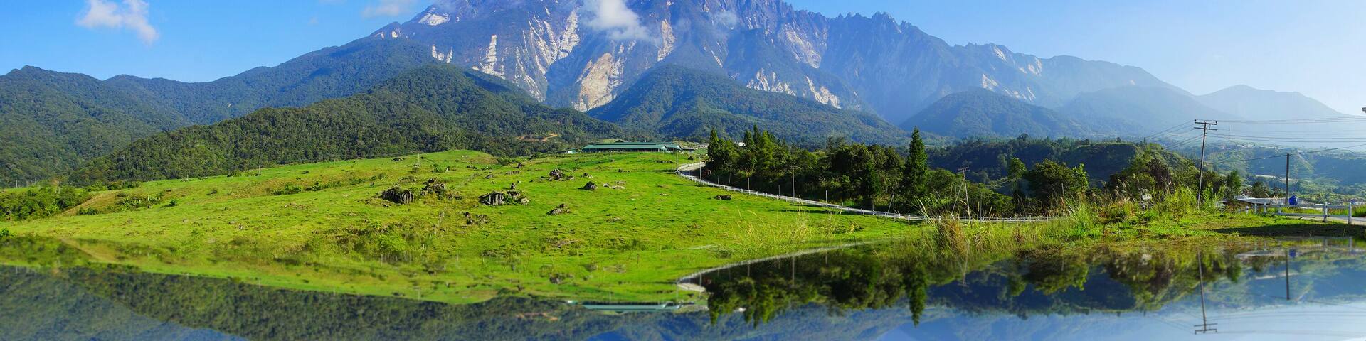 Reflection Beautiful View of Mount Kinabalu During Blue Sky.