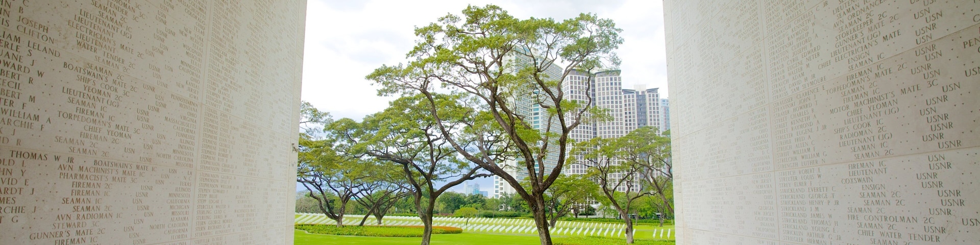 Manila que incluye un cementerio, una ciudad y un jardín