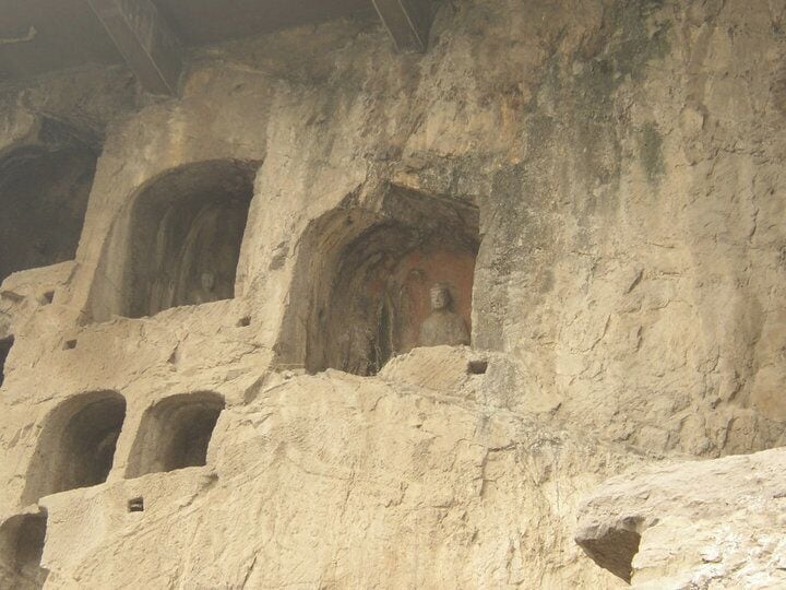 Longmen Grottoes are hundreds, if not thousands of caves with carvings in them.  Some are huge, and some are very small.  It is very neat to see and I highly recommend it!