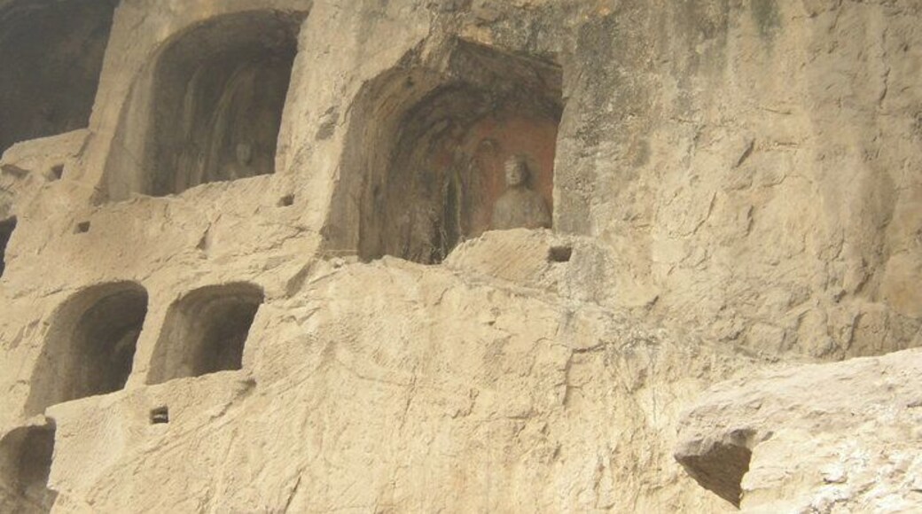 Longmen Grottoes are hundreds, if not thousands of caves with carvings in them. Some are huge, and some are very small. It is very neat to see and I highly recommend it!