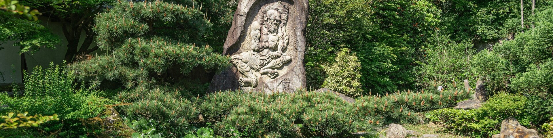 Ishiyama-dera showing a pond, heritage elements and a park