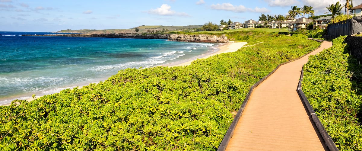 Beautiful pathway at Oneloa Bay on the island of Maui, Hawaii, USA. Oneloa Bay and Oneloa Beach are located near Kapalua on West Maui and are famous tourist destinations.