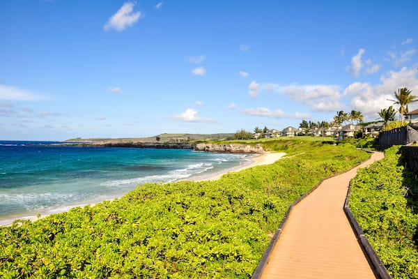 Beautiful pathway at Oneloa Bay on the island of Maui, Hawaii, USA. Oneloa Bay and Oneloa Beach are located near Kapalua on West Maui and are famous tourist destinations.