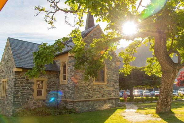 Church of St Peters which includes a sunset, heritage elements and a church or cathedral