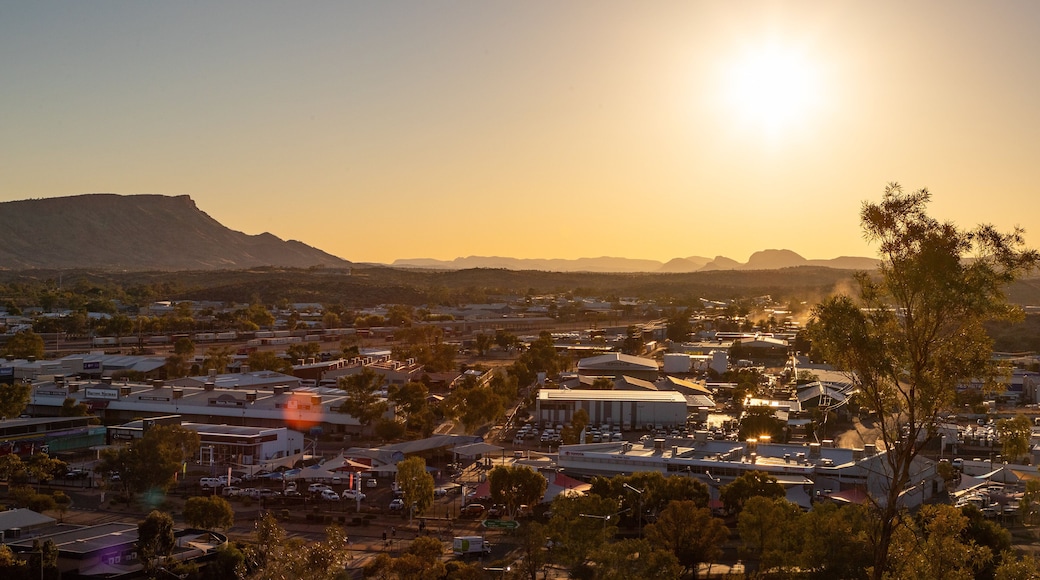 Anzac Hill which includes landscape views, a small town or village and a sunset