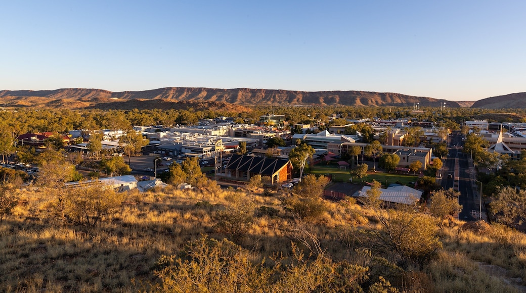 Anzac Hill showing a sunset, landscape views and a small town or village