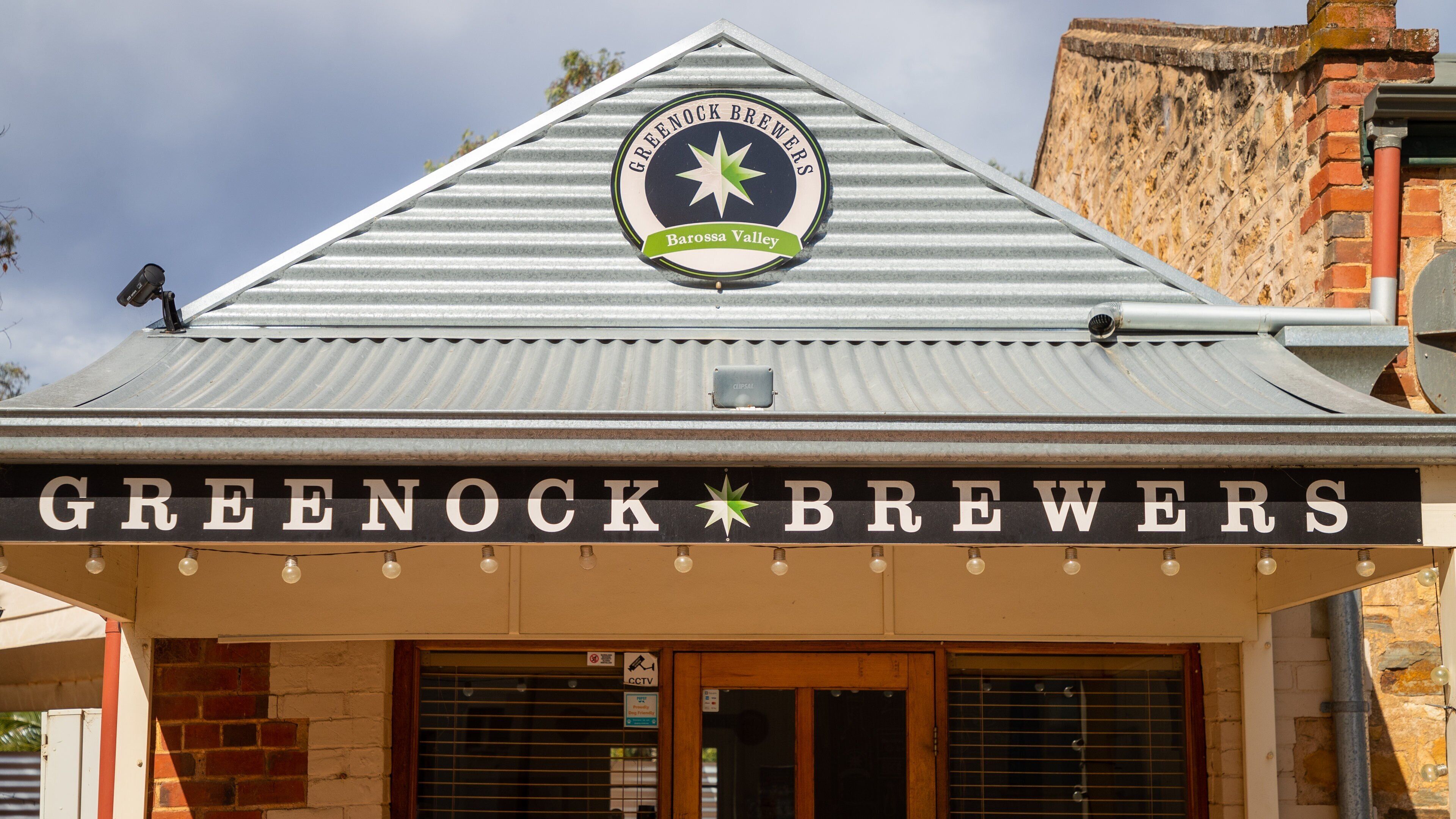 A building with a sign reading "GREENOCK BREWERS Barossa Valley" and a star logo.