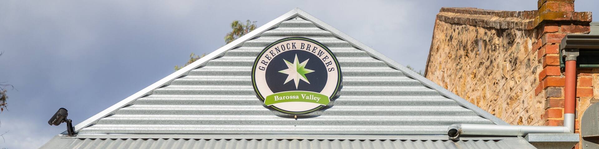 A building with a sign reading "GREENOCK BREWERS Barossa Valley" and a star logo.