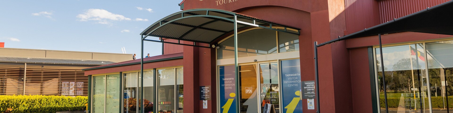 Big Golden Guitar Tourist Centre featuring signage