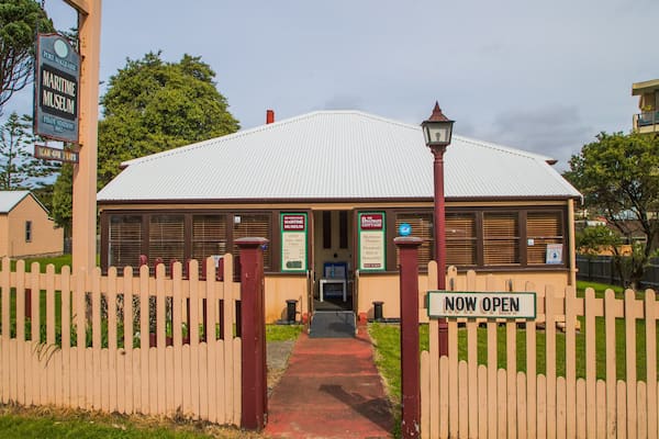 Mid North Coast Maritime Museum showing a small town or village