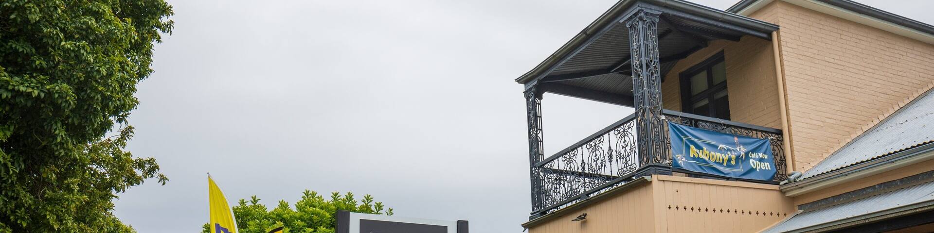 A building with a balcony and a sign for Grafton Regional Gallery.
