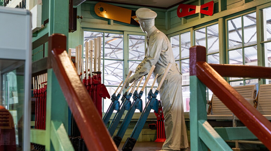 Archer Park Station & Steam Train Museum featuring a statue or sculpture and interior views