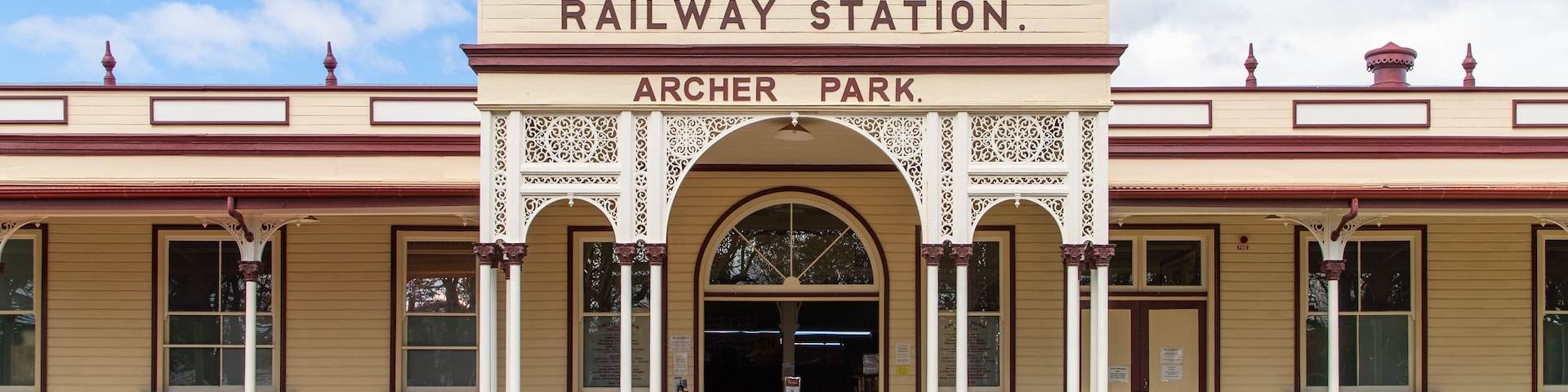 Archer Park Station & Steam Train Museum featuring signage and heritage elements
