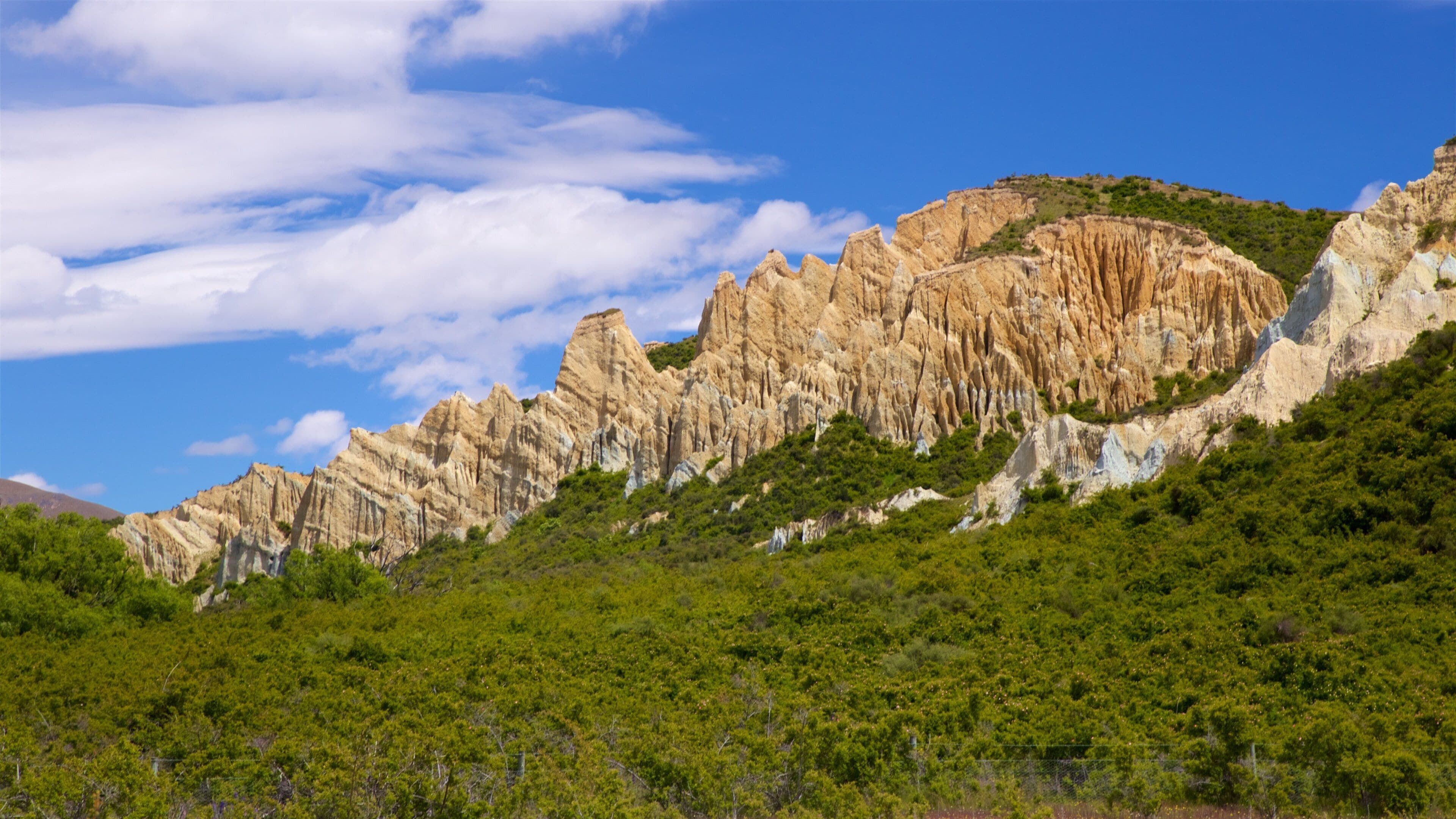 Clay Cliffs which includes tranquil scenes and mountains