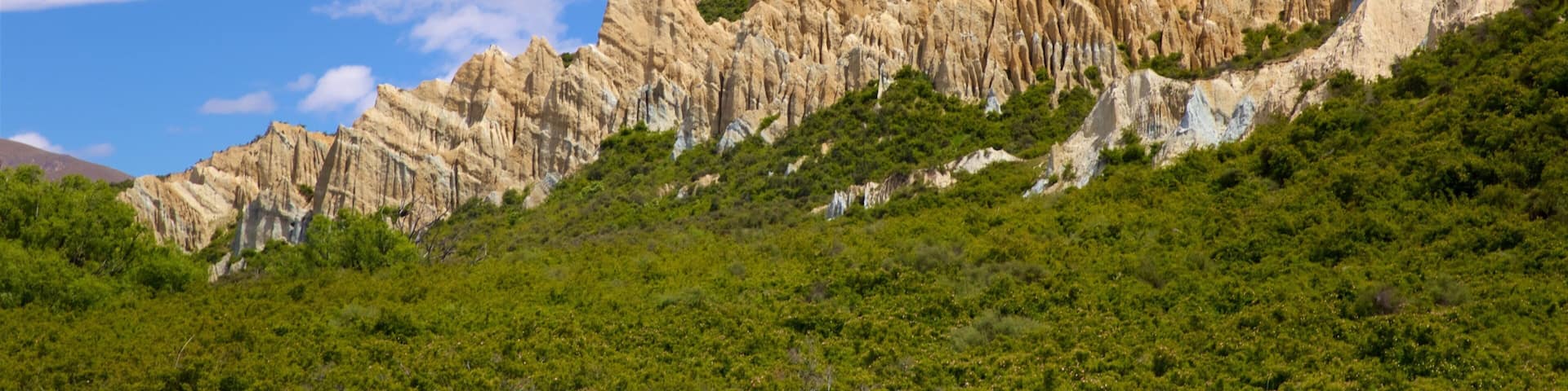 Clay Cliffs which includes mountains and tranquil scenes