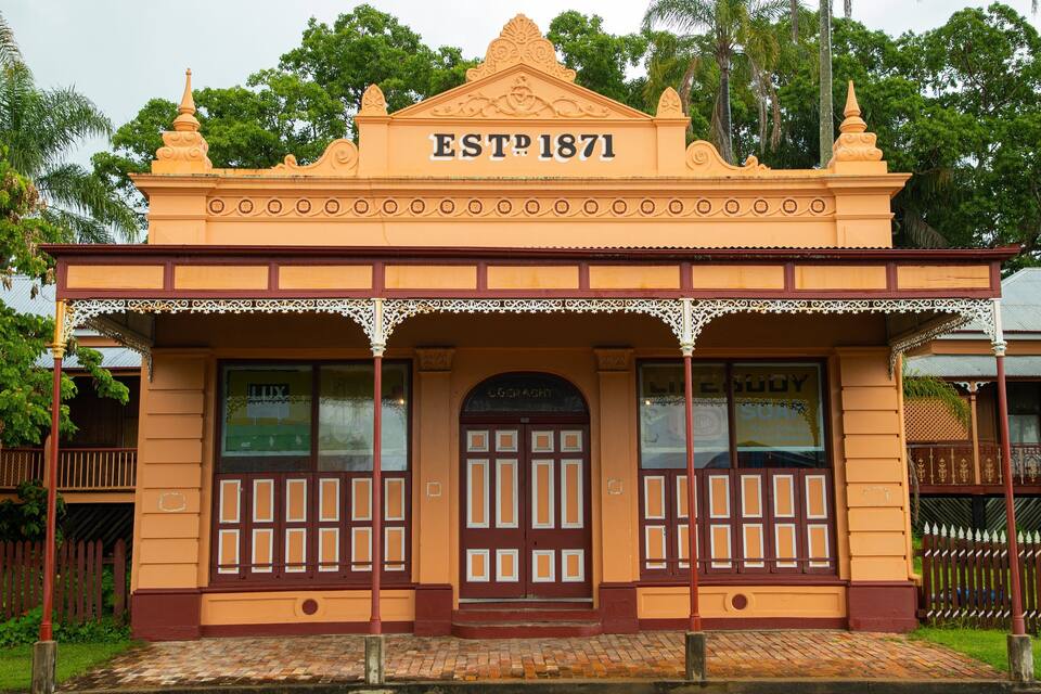 A historic building with a date plaque reading "EST 1871".