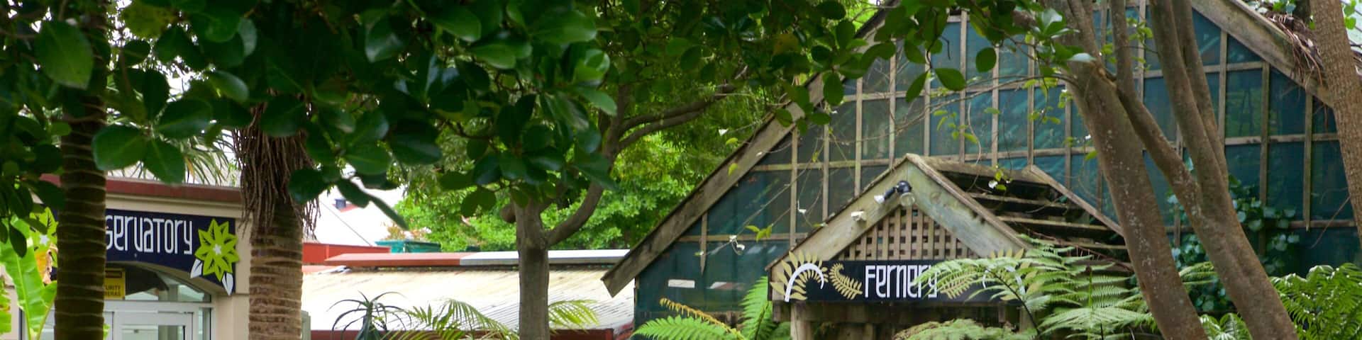 A greenhouse with a sign that reads "Fernery."