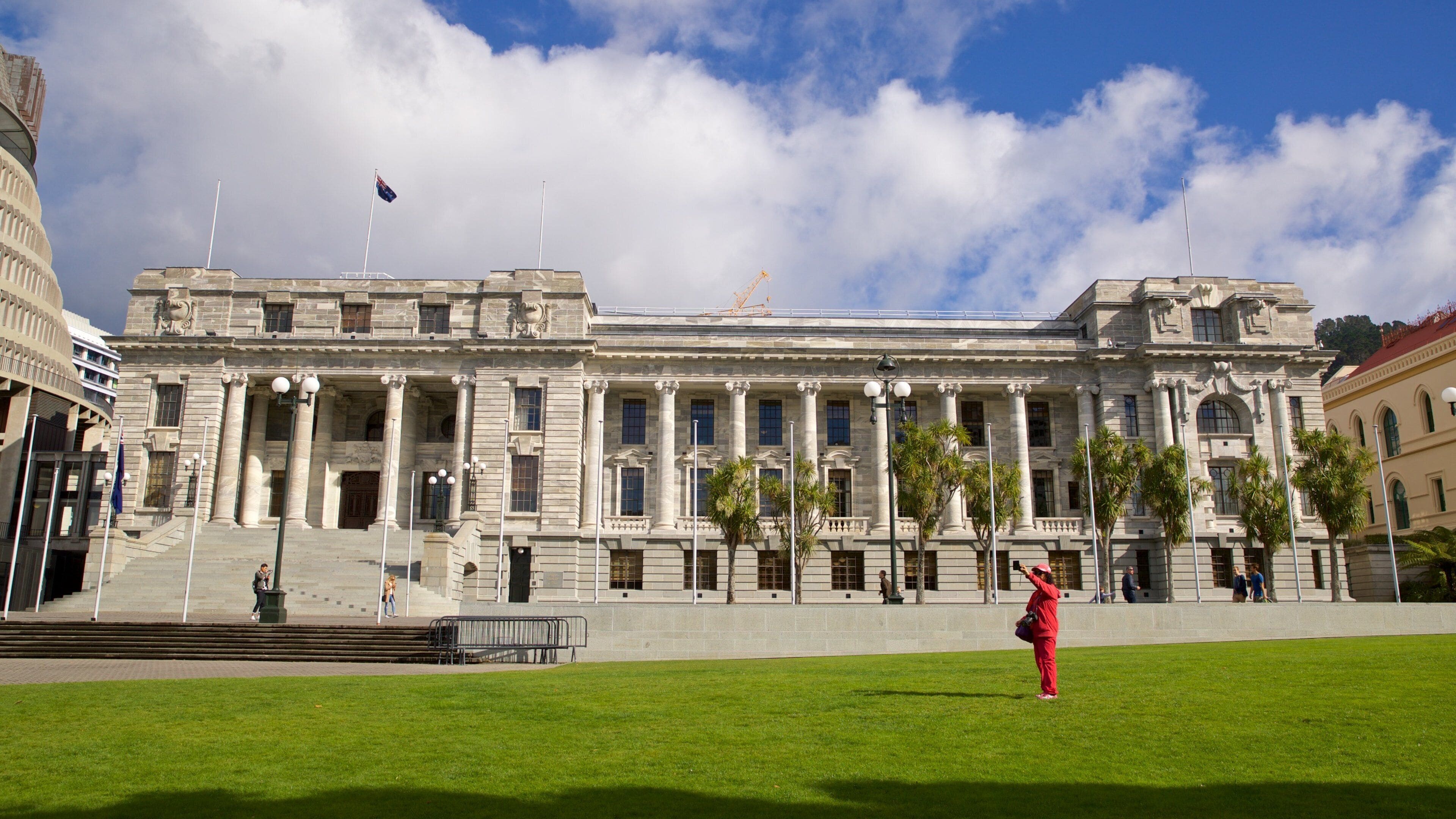 Parliament House showing heritage architecture as well as an individual femail