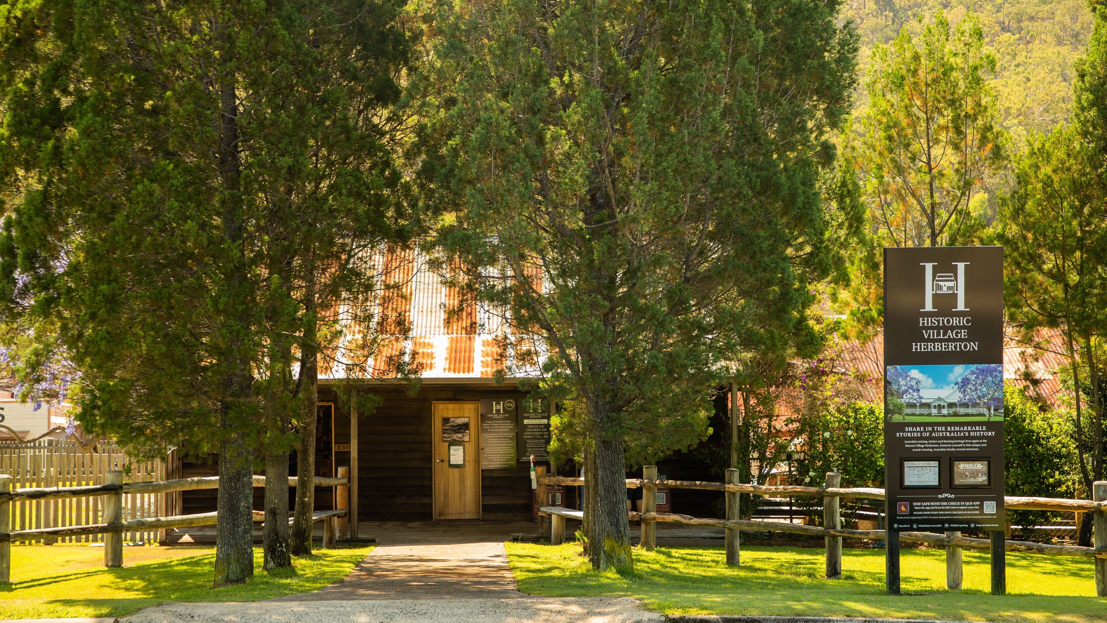 Herberton Historic Village which includes signage and a small town or village
