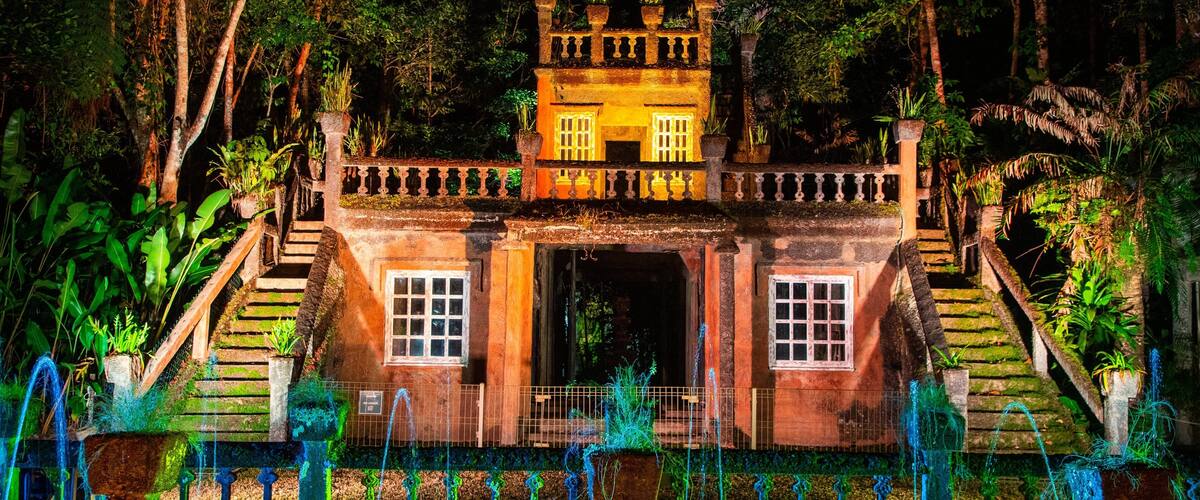 Paronella Park which includes building ruins, heritage elements and night scenes