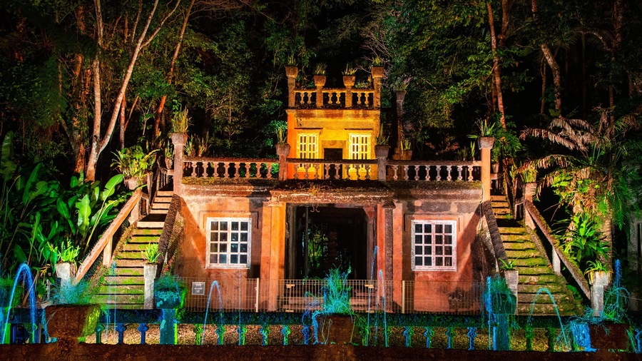 Paronella Park which includes building ruins, heritage elements and night scenes