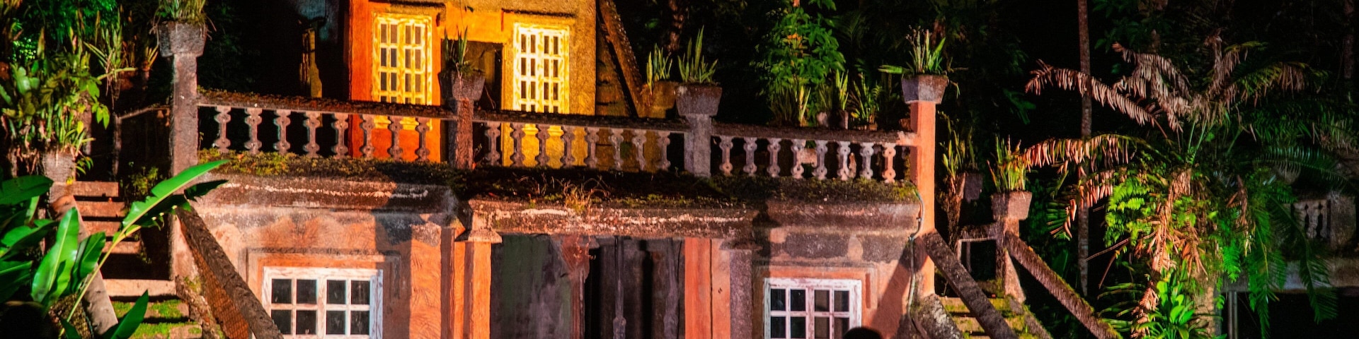 Paronella Park which includes night scenes, heritage elements and a ruin