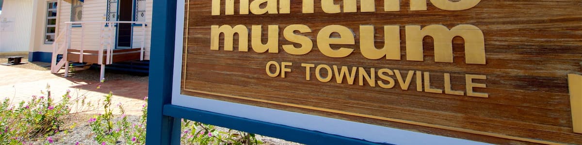 A wooden sign for the Maritime Museum of Townsville.