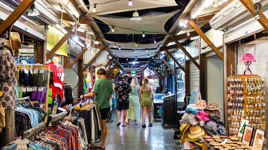Cairns Night Markets showing markets as well as a small group of people