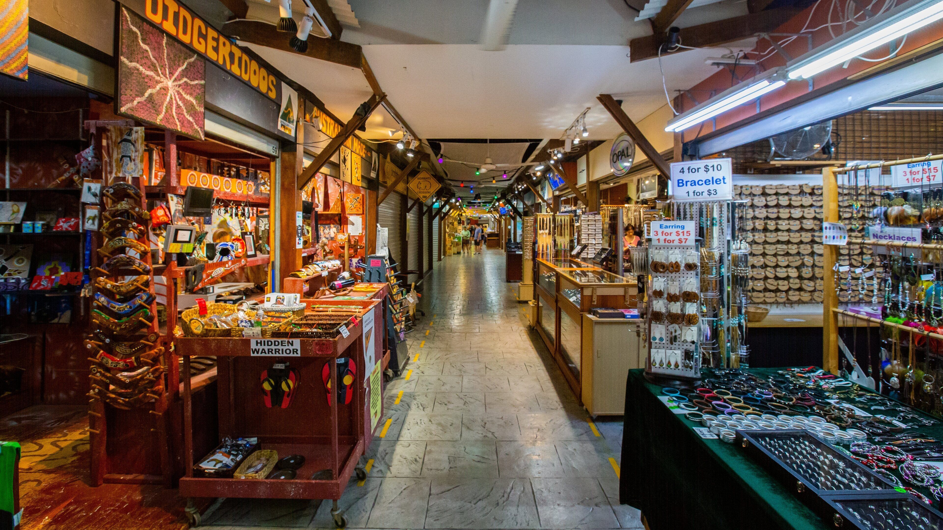 Cairns Night Markets which includes interior views and markets