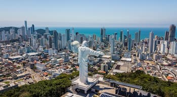 Panoramic aerial view of the Cristo Luz statue and buildings in the city of Balneário Camboriú – Santa Catarina - Brazil