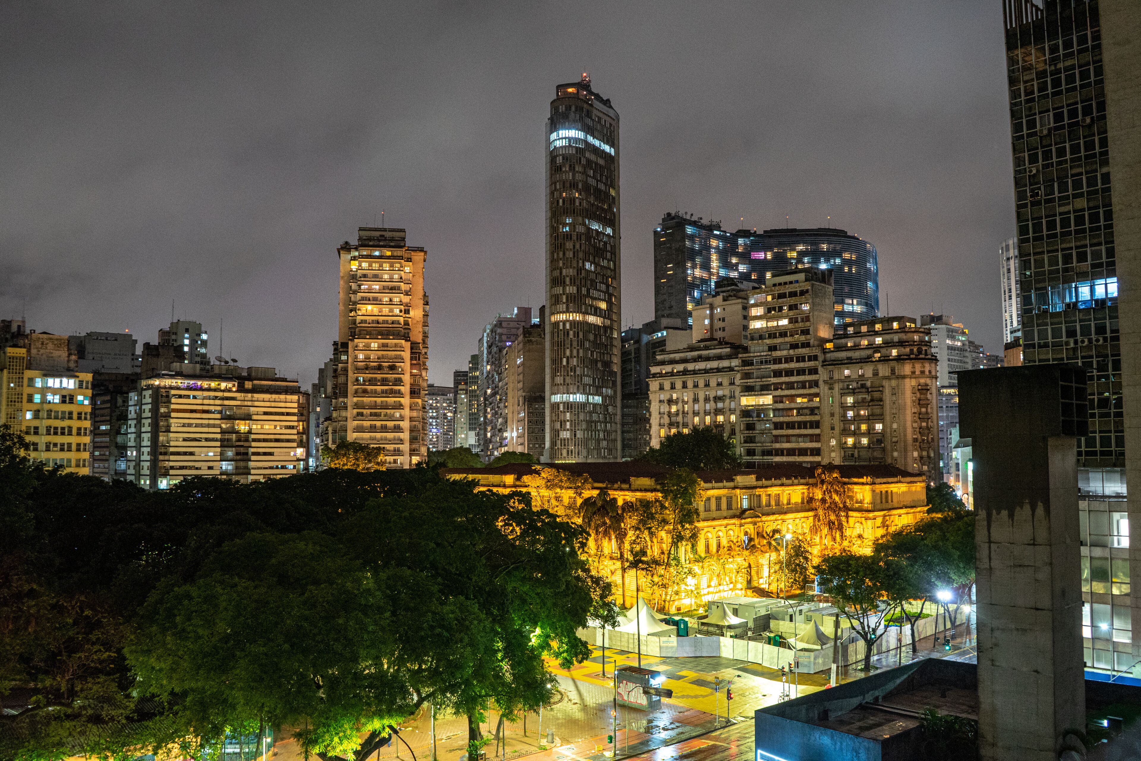 São Paulo city center at night. The region of República square and the amazing lights of the skyscrapers. Praça da República, Copan e edifício Itália.