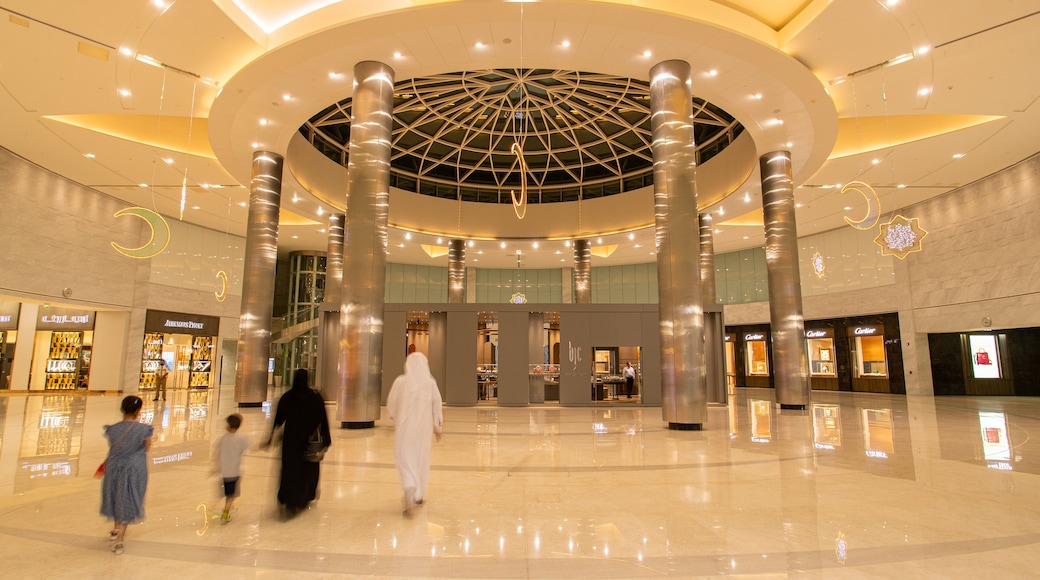 Moda Mall which includes shopping and interior views as well as a family