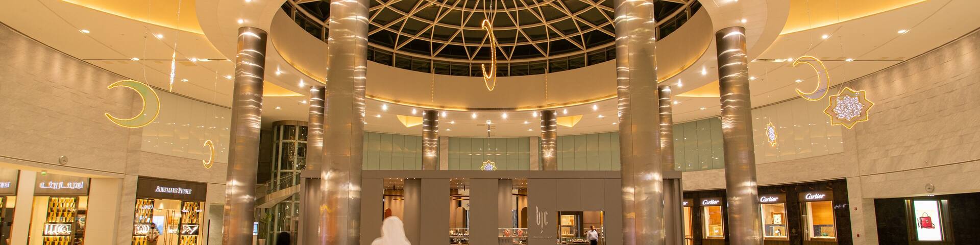 Moda Mall which includes shopping and interior views as well as a family