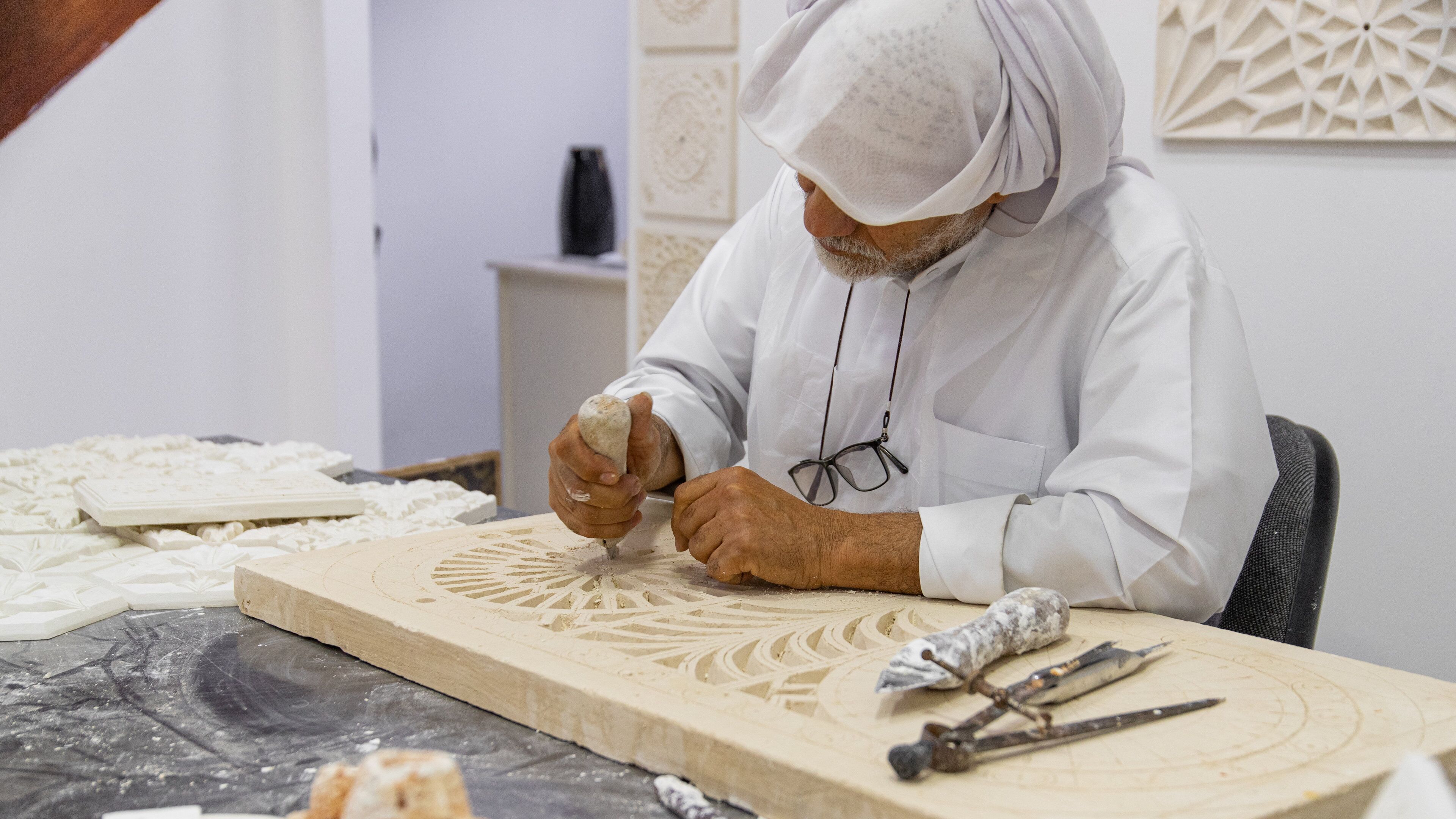 Al Jasra Handicraft Centre showing interior views as well as an individual male
