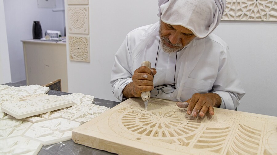 Al Jasra Handicraft Centre showing interior views as well as an individual male