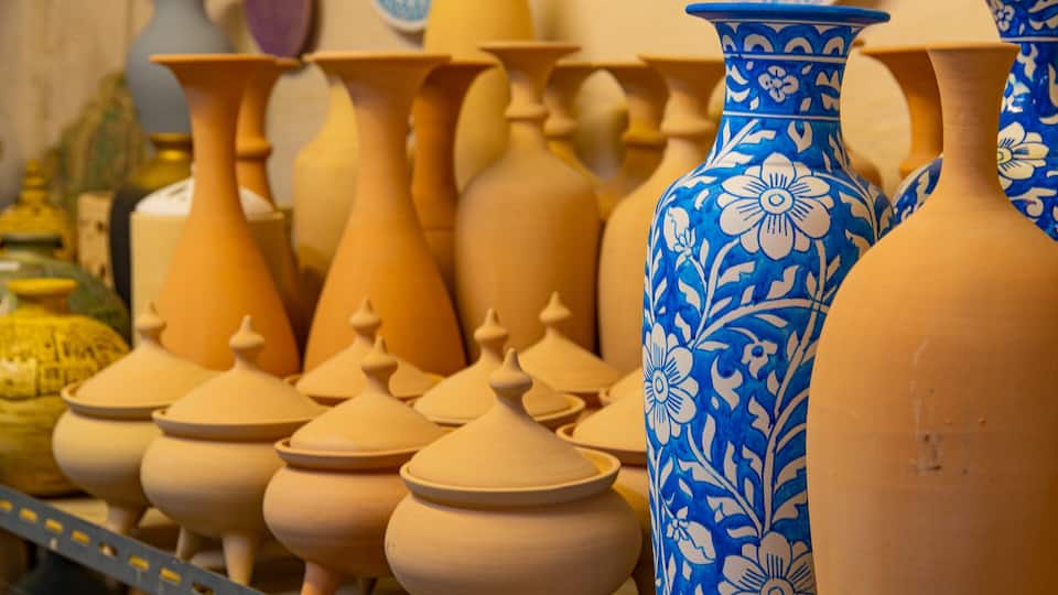 A collection of pottery with various shapes and designs.