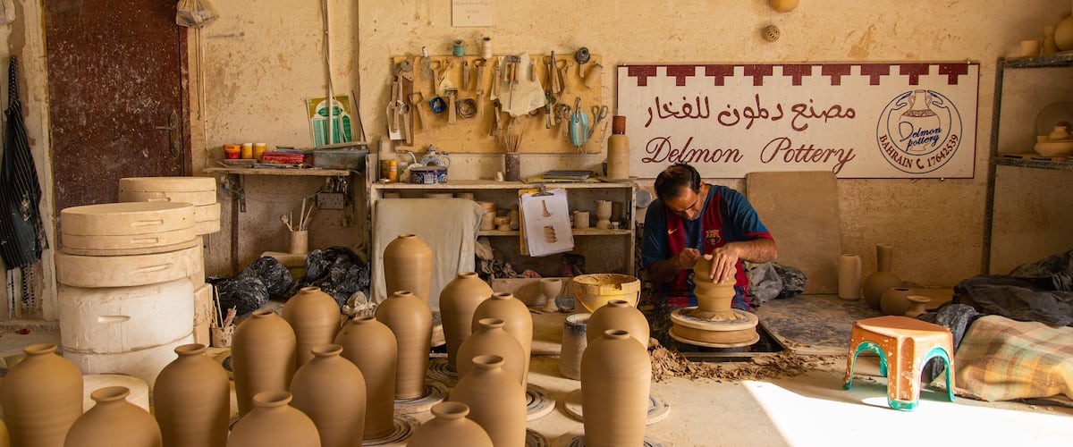 Pottery Workshop featuring interior views as well as an individual male