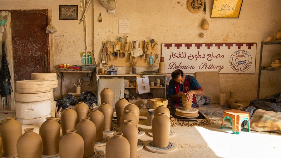 Pottery Workshop featuring interior views as well as an individual male