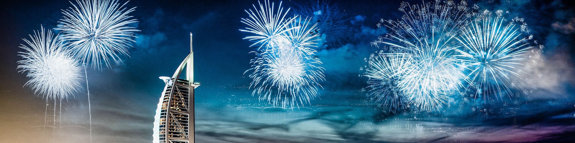 fireworks around Burj Al Arab - exotic New Year destination, Dubai, UAE