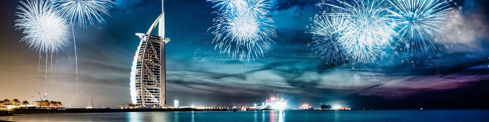 fireworks around Burj Al Arab - exotic New Year destination, Dubai, UAE