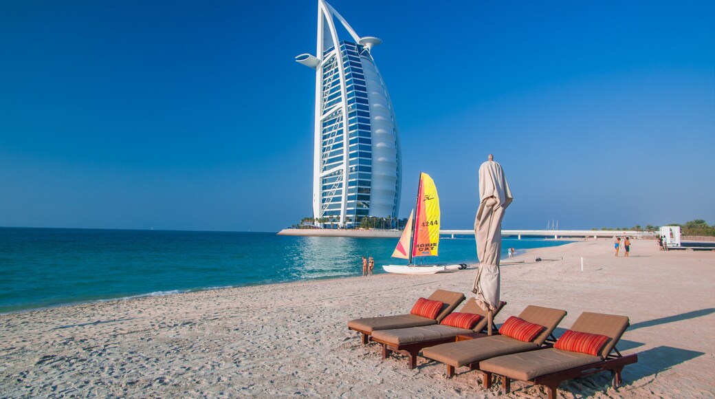 DUBAI,UAE-JAN 22: View of the luxury beach of Dubai and Burj al arab on the 22th of january 2010, in Dubai,Uae.The Bur is the most exclusive hotel of the world, and one of the few seven star 2010 in