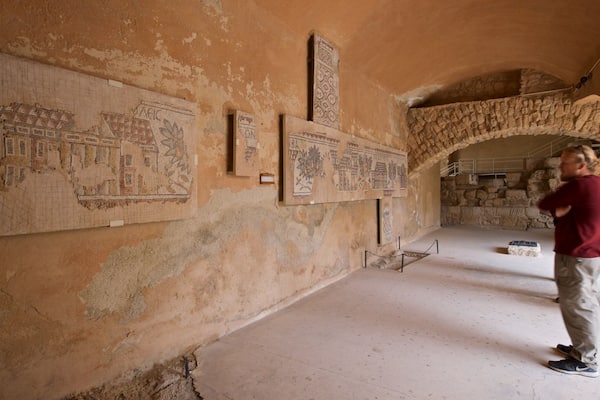 Madaba Archaeological Park featuring art and heritage elements as well as an individual male