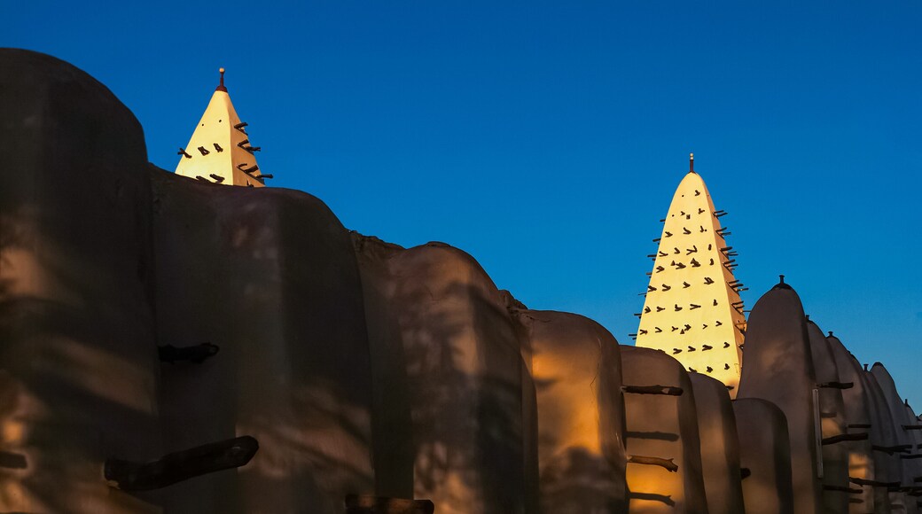 Walls and towers of the Mosque of Bobo-Dioulasso building exterior at sunset, landmark of Burkina Faso, West Africa.
