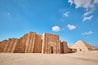 Saqqara, Egypt - January 2, 2024: Entrance to the mortuary temple near the pyramid of Djoser in Saqqara. Roofed colonnade entrance of Step Pyramid