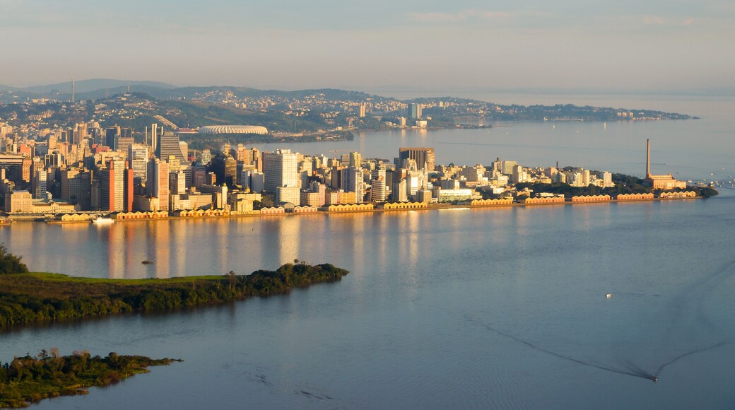 Porto Alegre, Brazil skyline. City located in Rio Grande do Sul State. Porto Alegre downtown and harbor reflecting in Guaiba Lake / River.