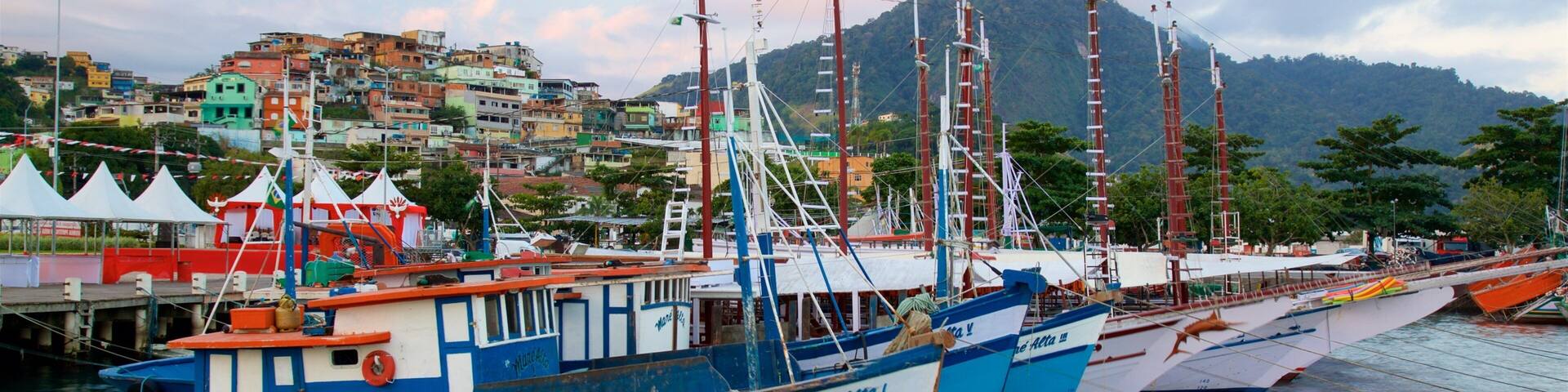 Cais Turistico de Santa Luzia featuring a bay or harbour and a coastal town