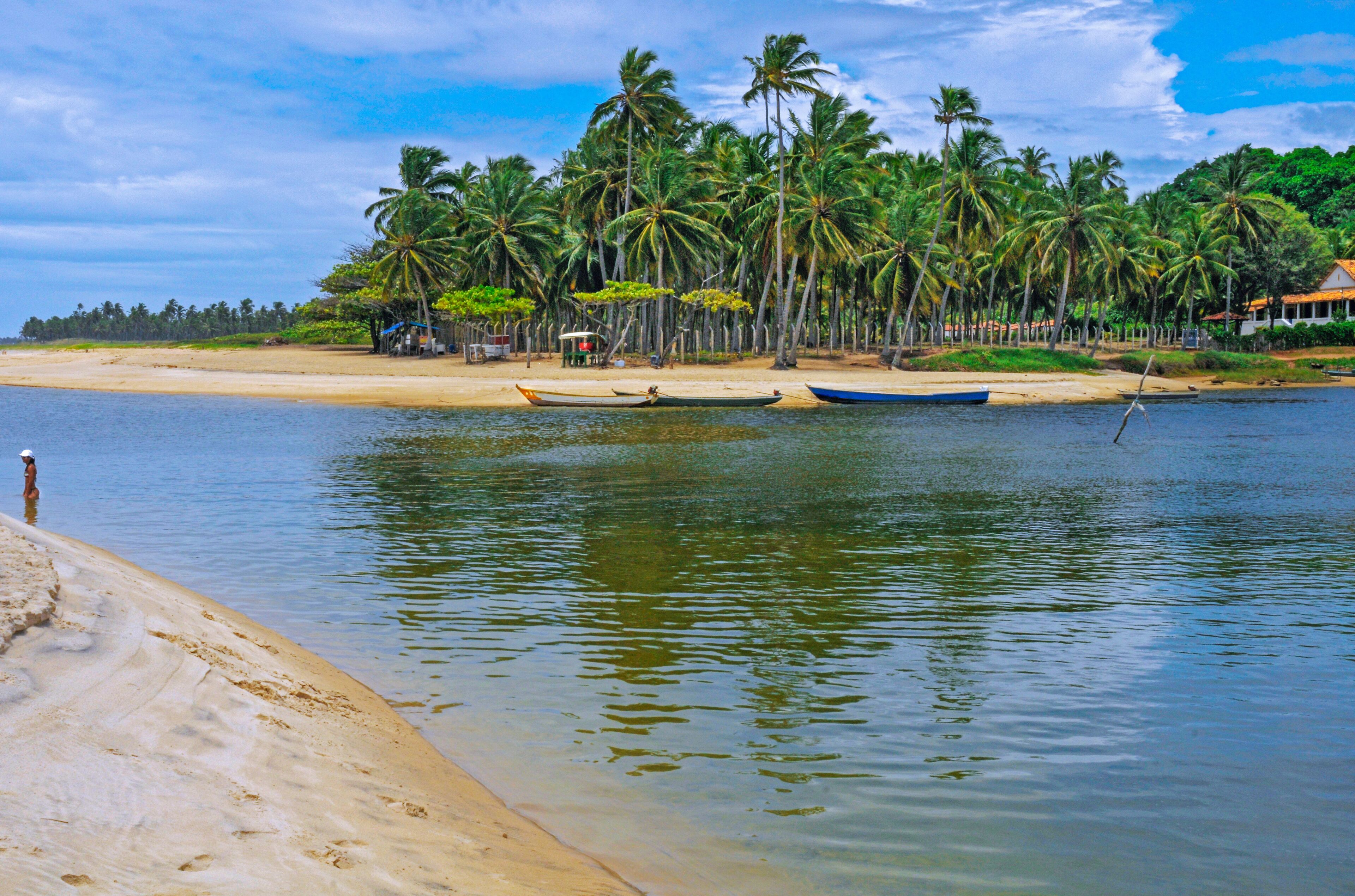 Dunas de Marape. It is considered one of the ten most beautiful beaches in Brazil, surrounded by mangroves, with white sands meeting dark waters from the Jequia Lagoon and River. Alagoas, Brazil, 2016