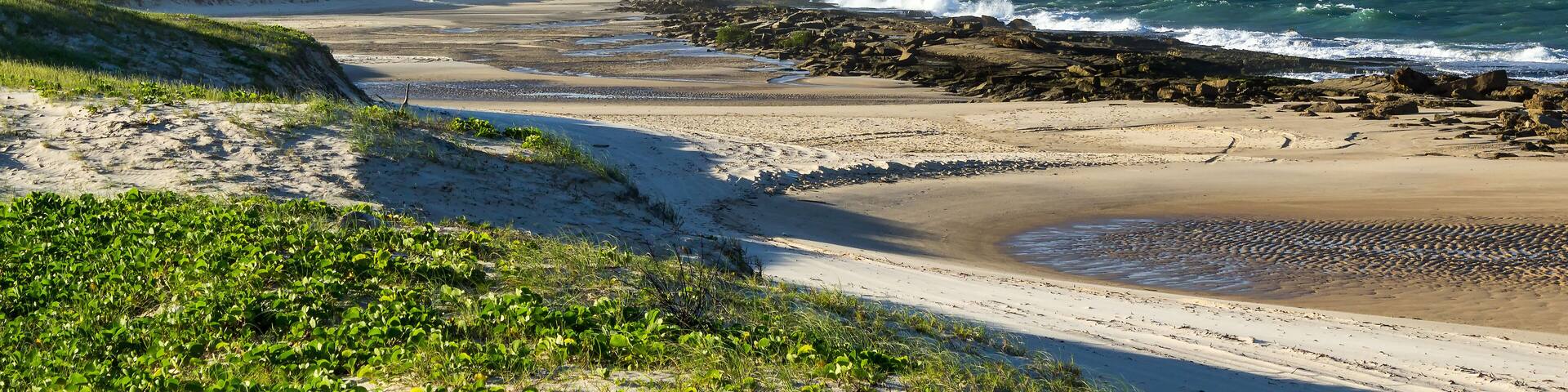 Coral reefs in low tide in Camurupim Beach, Rio Grande do Norte, Brazil
