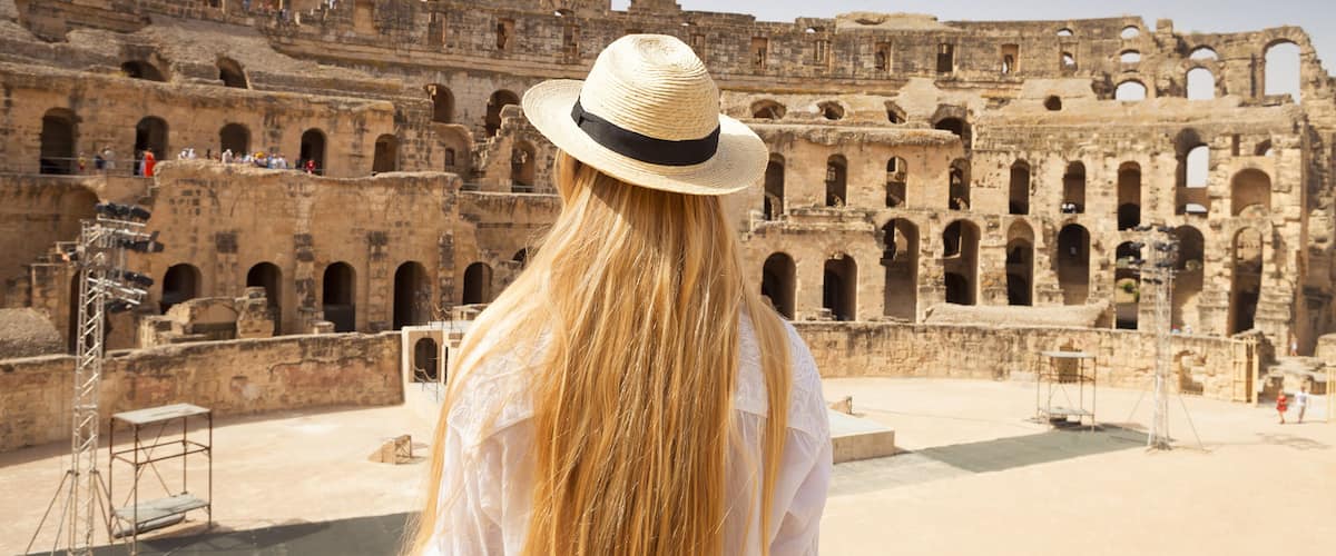 Woman in Tunisia El Jem roman apmphitheatre. Largest colosseum in in North Africa. El Jem,Tunisia. UNESCO